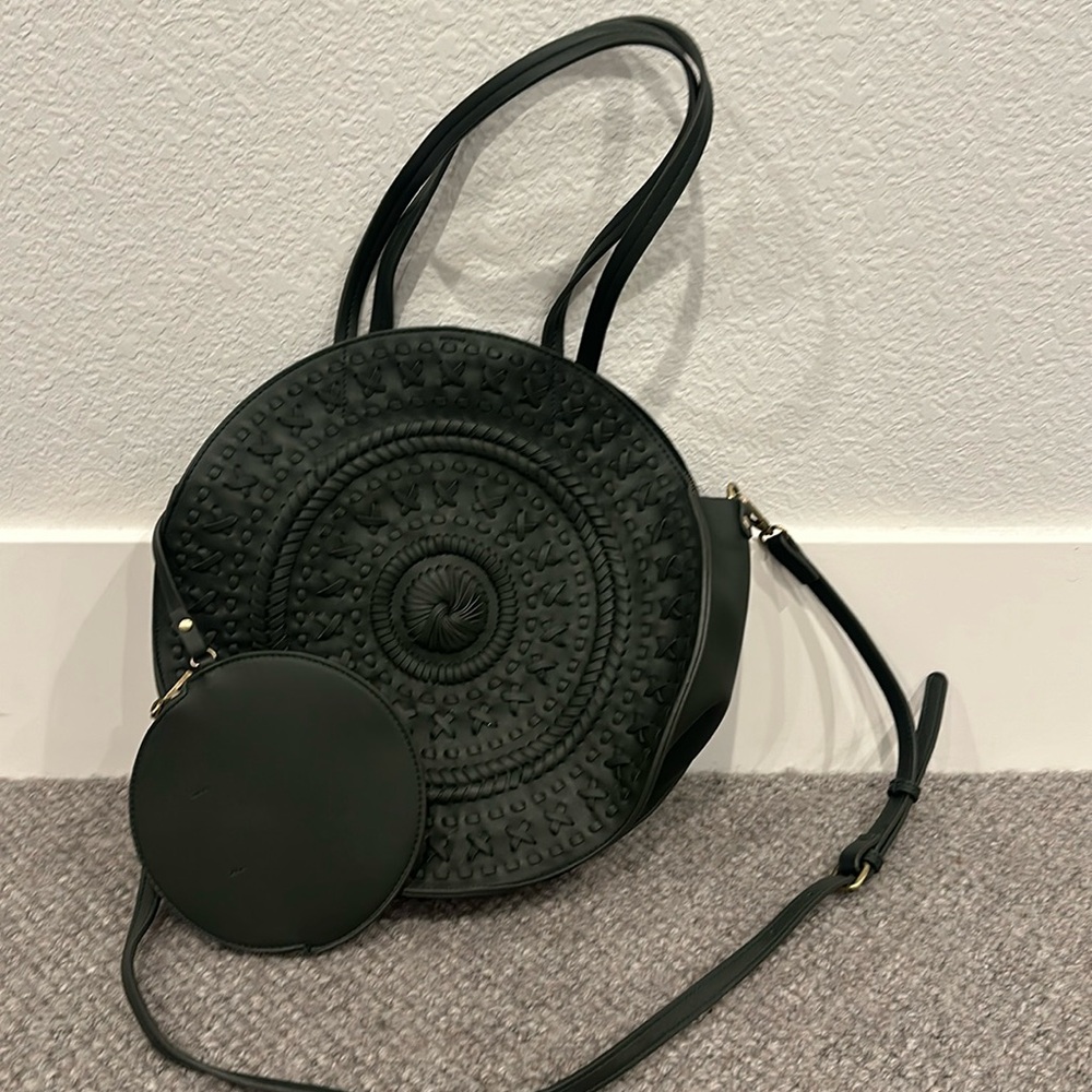 Green Anthropologie handbag.